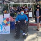 Captain Frank Wendzel is visited and greeted Happy Birthday from Orange County Fifth District Supervisor, Lisa Bartlett